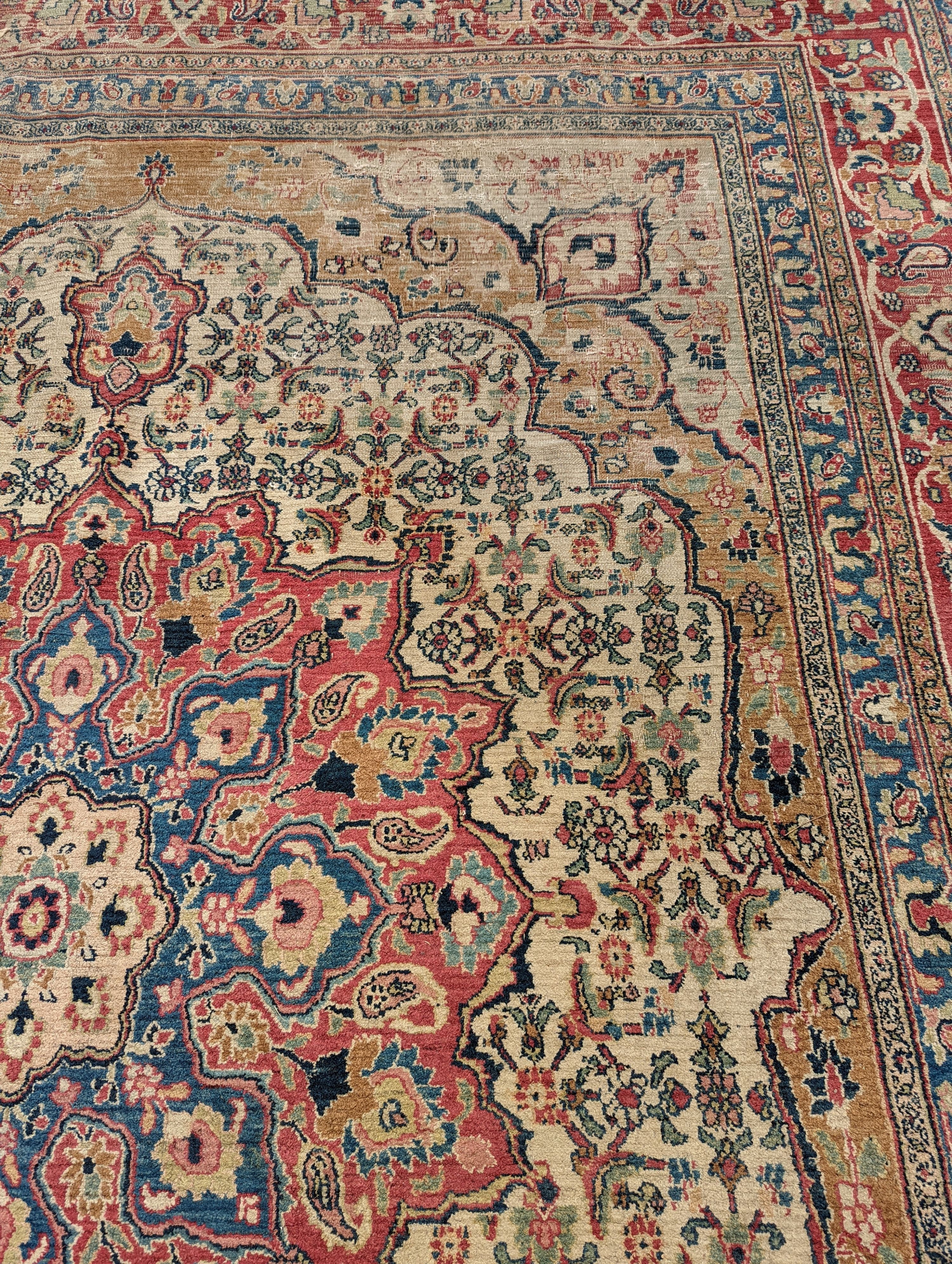 An Isfahan ivory ground carpet, 432 x 330cm